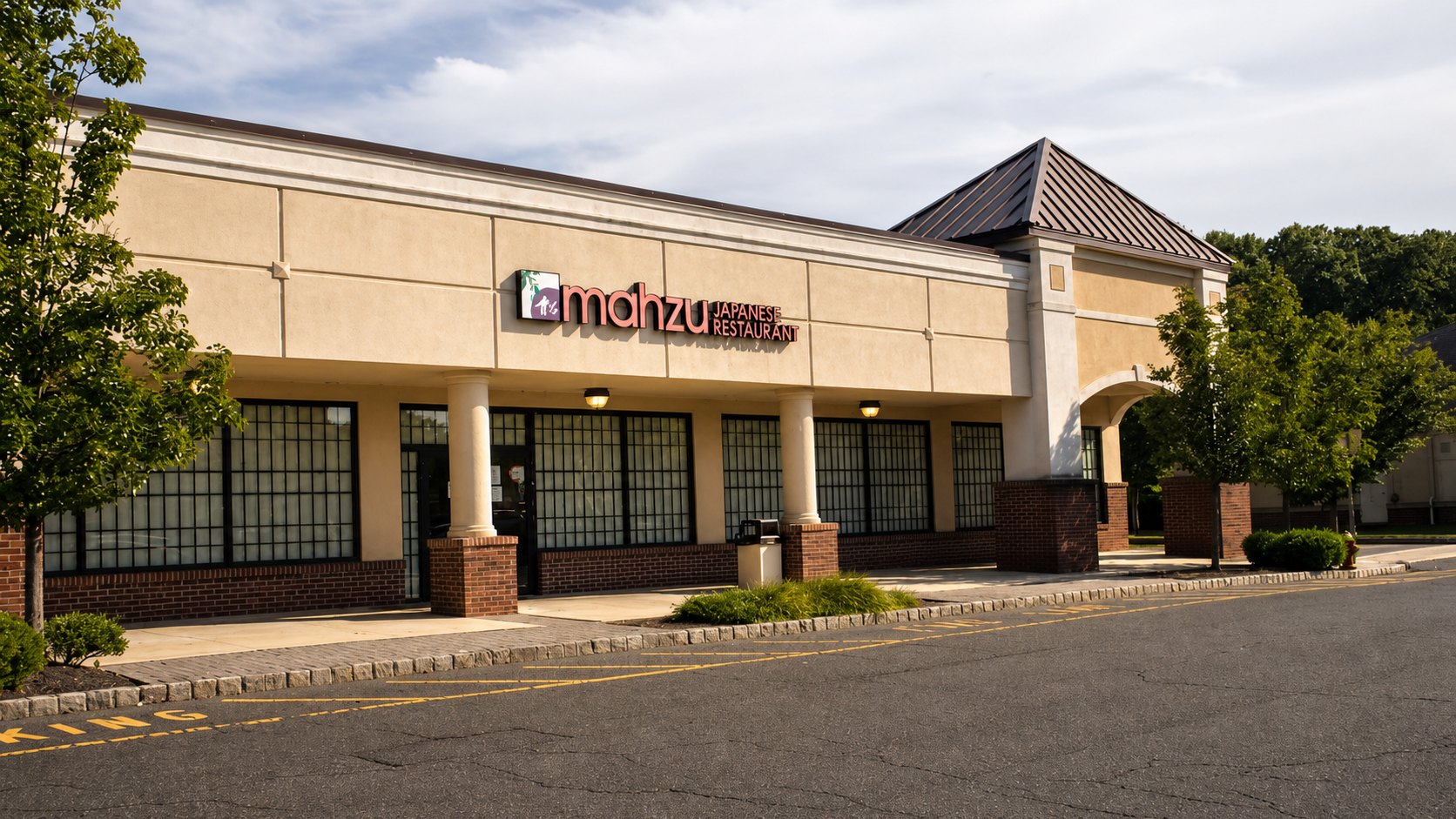The Castaways building from the parking side, daytime