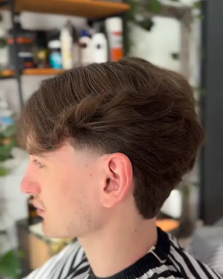 Longer flow cut with a tapered neckline